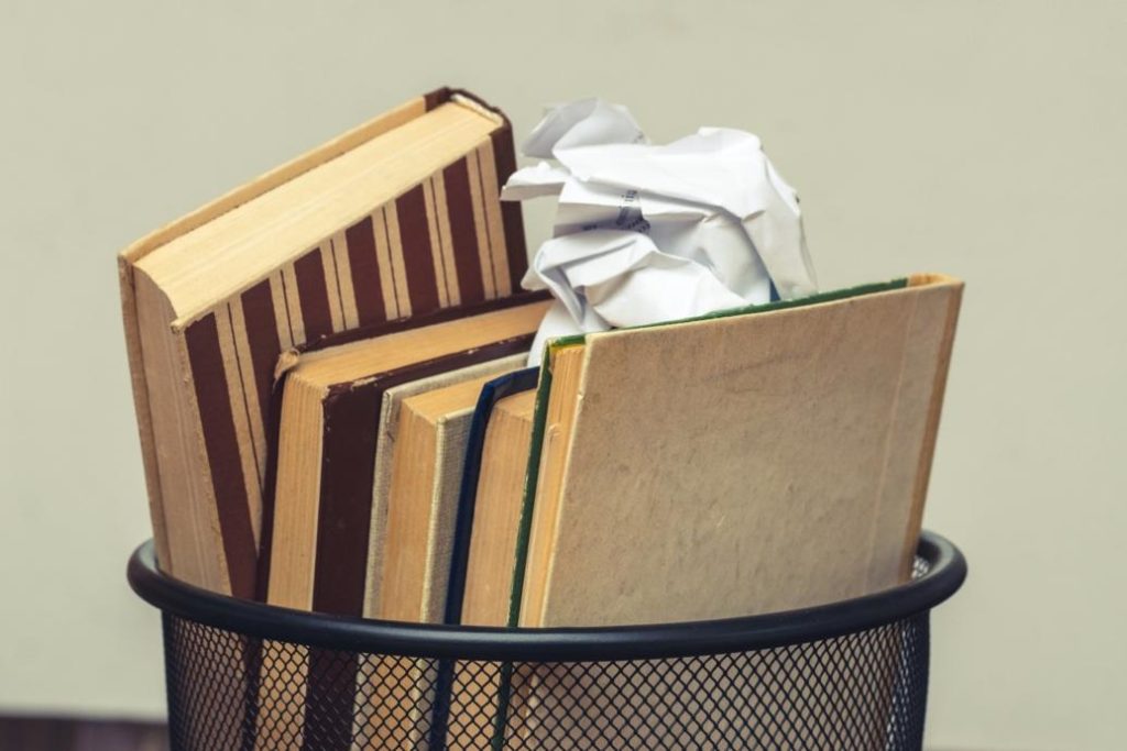 Books in a trash can