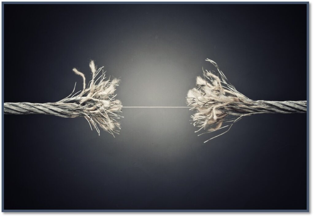 Rope fraying apart on a black background